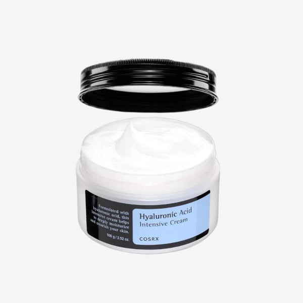 Crème Acide Hyaluronique au thé vert COSRX 50 ML dans un pot ouvert montrant la texture de la crème.
